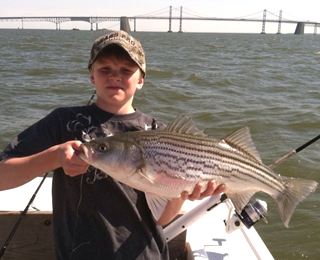 Mason Hallock Holding a Fish