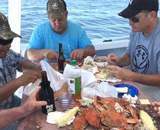 People Eating Crabs